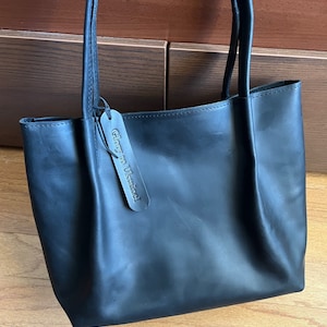 a AA AAA Quality Large Capacity Cowhide Birkin Bag Genuine Leather Togo  Leather Women - China Hand Bags and Luxury Women Bag price