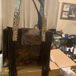 Brennan added a photo of their purchase