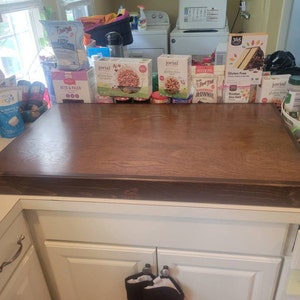 Gabi added a photo of their purchase