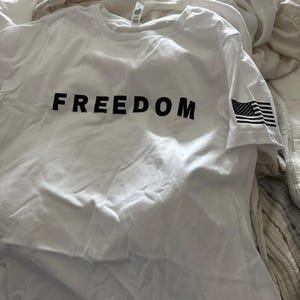 Nicole added a photo of their purchase