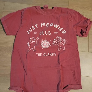 Emi added a photo of their purchase