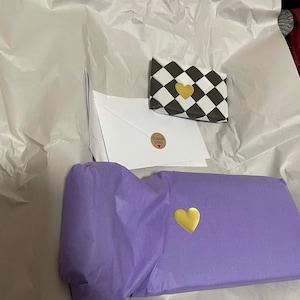 Khursheda added a photo of their purchase