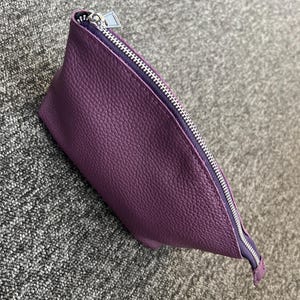 Aline added a photo of their purchase