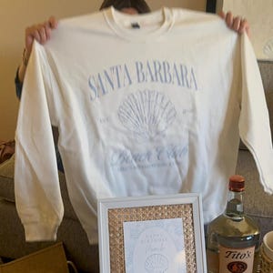 Aileen added a photo of their purchase
