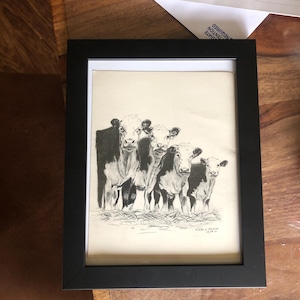 Sarah added a photo of their purchase
