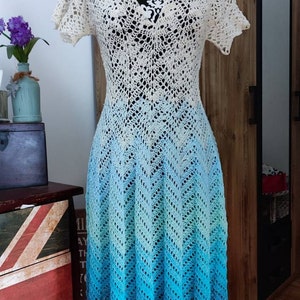 nami dress crochet I finished my Nami dress using the Nami top and skirt pattern to make a slightly different version! what do you think? I love the fit on this one and the flared sleeves! Also another red make for