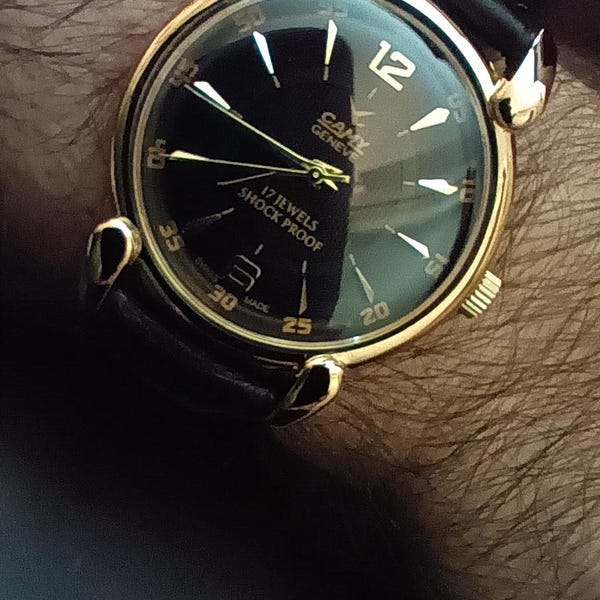 Montre Vintage Roamer St Moritz - Mécanique Suisse, Boîtier Acier Carré Bleu - Pièce Rare Occasion