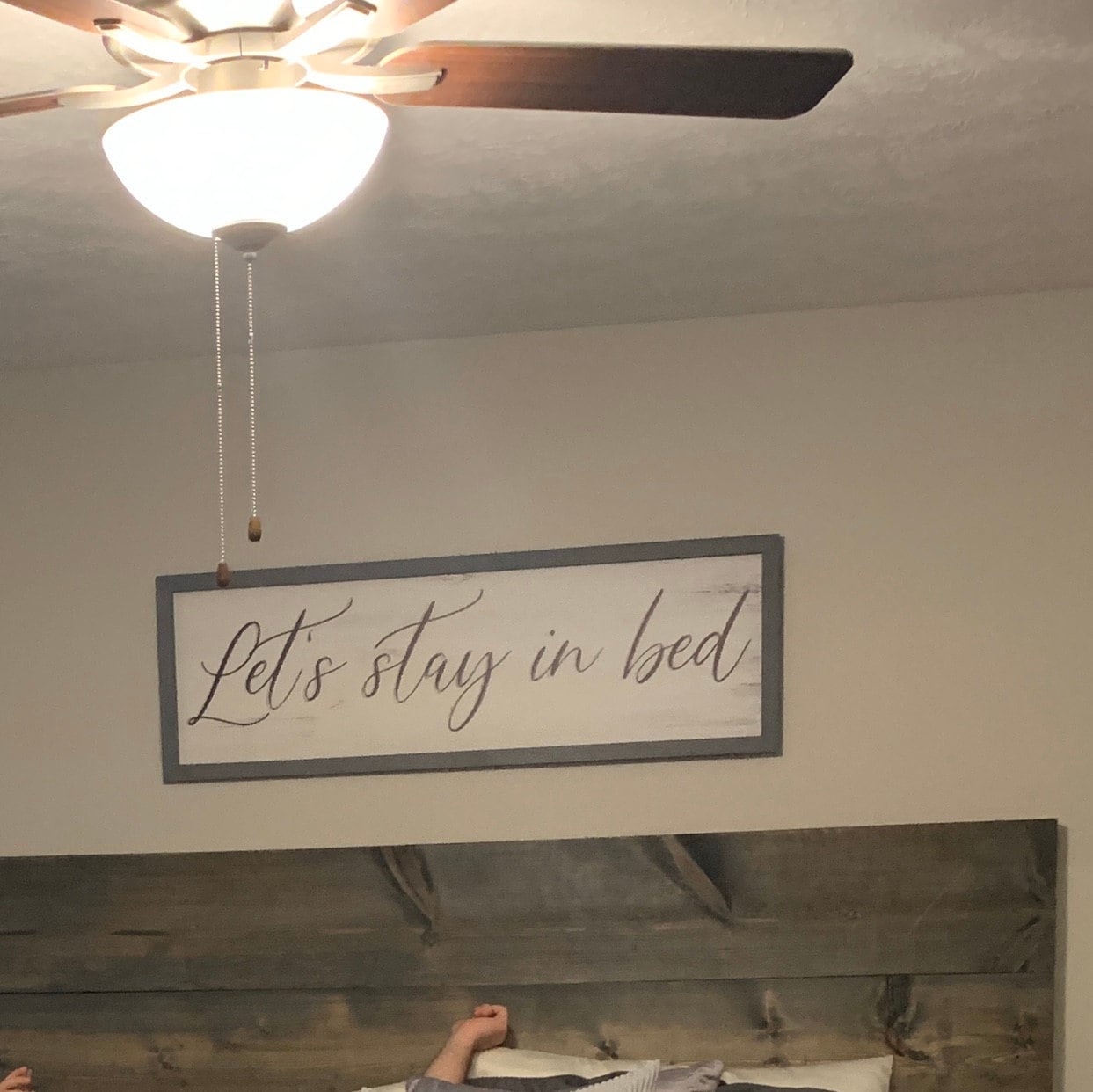 led sign above bed