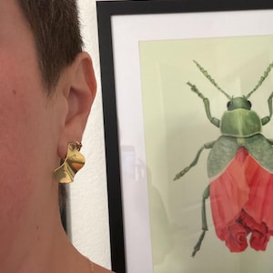 Priscila added a photo of their purchase