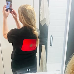 Alexandra added a photo of their purchase