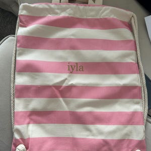 Mia added a photo of their purchase