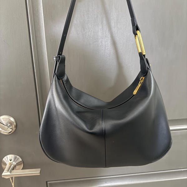 Red leather crossbody bag with drop-shaped detail