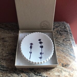 Adriana added a photo of their purchase