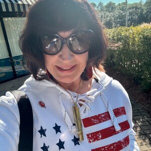 Lisa added a photo of their purchase
