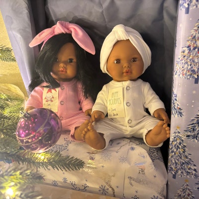 Noa Romper and Bonnet Set (28cm Doll) in Baby Peacock Print by Minikane main image 1