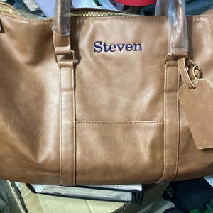 Jenny added a photo of their purchase