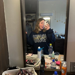 Ellie added a photo of their purchase