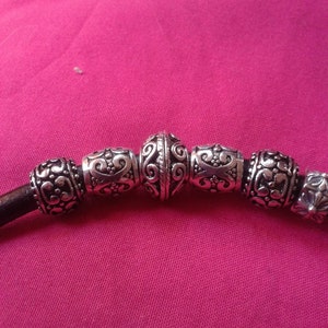 11mm wide x 9mm hole diameter 5mm package of 6 6 Silver scroll pattern with Black Antiquing large hole beads