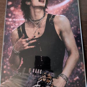 Nicola added a photo of their purchase