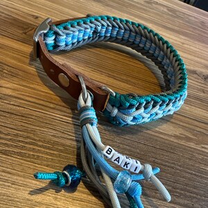 本物のパラコード®を使用した編み込み犬用首輪。ネームタグ付き