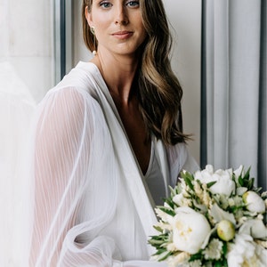 Katie added a photo of their purchase