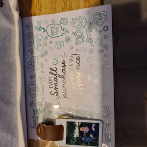 Roxanne added a photo of their purchase