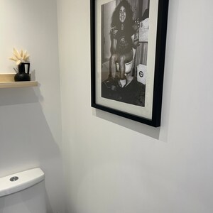 Courtney added a photo of their purchase
