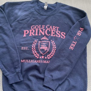 Laura added a photo of their purchase