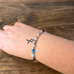 Cancer Awareness Bracelet (6mm Stretchy 18 Colors) Fits Most Adults. Great for Fundraisers or Showing support.