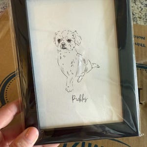 Caitlin added a photo of their purchase