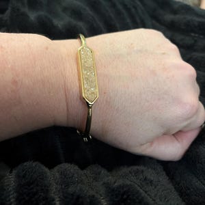 Tonya added a photo of their purchase