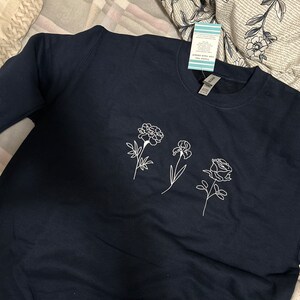 Sasha added a photo of their purchase