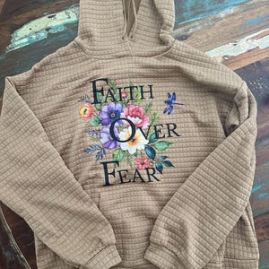 Laura added a photo of their purchase