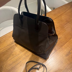 Ana added a photo of their purchase