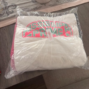 Jennifer added a photo of their purchase