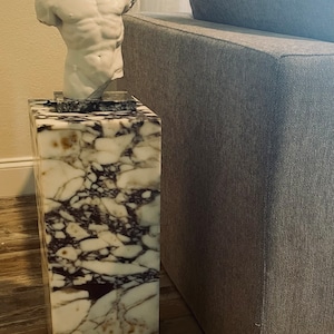 Mariel added a photo of their purchase