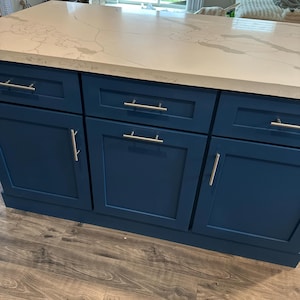 Leslie added a photo of their purchase