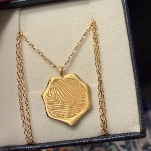 Claudia added a photo of their purchase