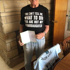 Angela added a photo of their purchase