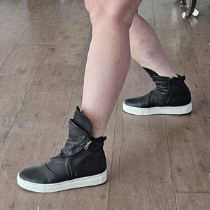 Elena Korobetskaya added a photo of their purchase