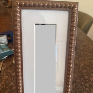 Charlotte added a photo of their purchase