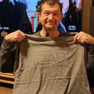 Rebecca added a photo of their purchase