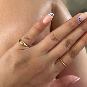 Sarina added a photo of their purchase