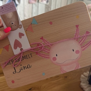 Aline added a photo of their purchase