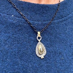 Andi added a photo of their purchase