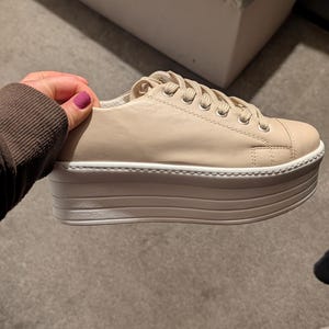 Mihaela added a photo of their purchase