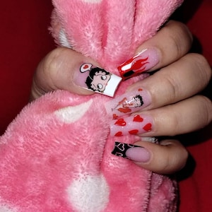 Nicki added a photo of their purchase