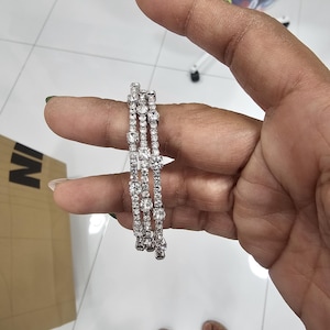 Arlene added a photo of their purchase