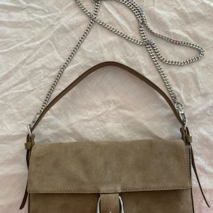 RACHEL added a photo of their purchase