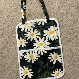 Sarah added a photo of their purchase